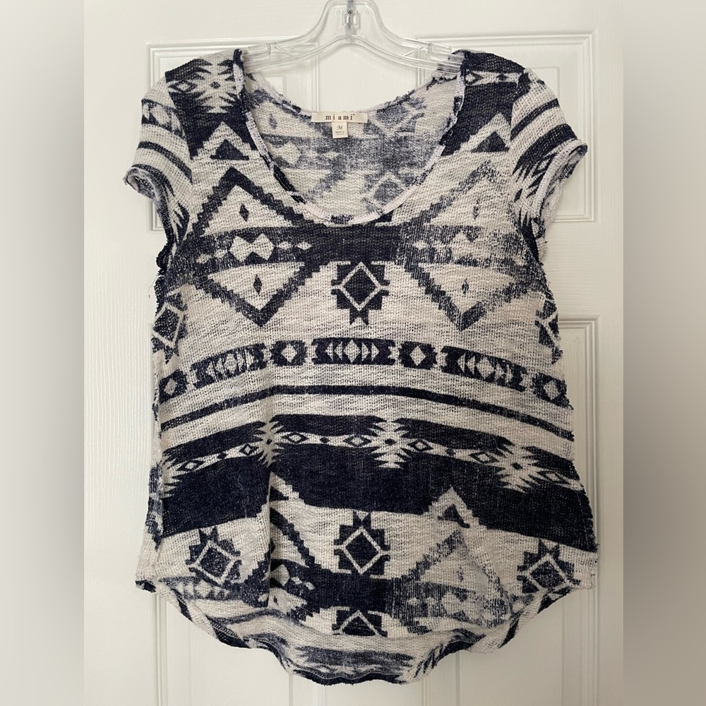 White and navy, size M, top with semi-open weave.